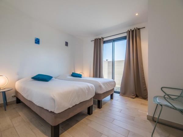 Résidence Pierre & Vacances Premium Vesna Rossa : photo 3 de la chambre maison 3 chambres avec climatisation, piscine privée de 7 mètres et jardin (6 adultes)