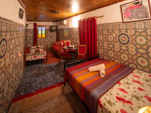 Maison Famille Tazi : photo 3 de la chambre suite familiale