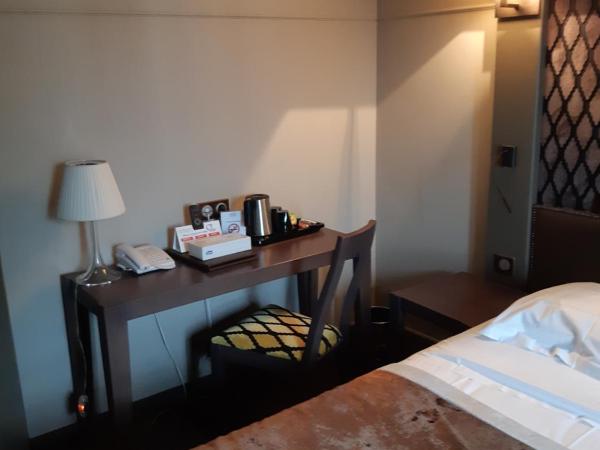 Logis Auberge Saint Simond : photo 2 de la chambre chambre double supérieure - vue sur ville