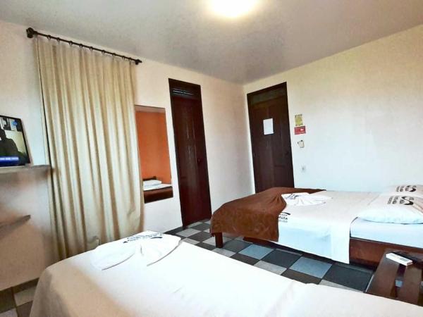 Hotel Enseada de Ponta Negra : photo 4 de la chambre chambre triple