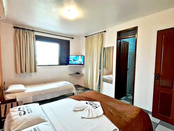 Hotel Enseada de Ponta Negra : photo 5 de la chambre chambre triple