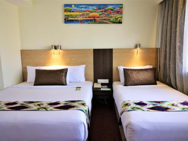 Hotel Grand Continental Kuala Lumpur : photo 7 de la chambre chambre triple premium