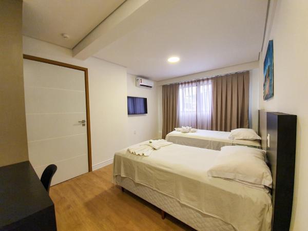Easy Suites Natal : photo 6 de la chambre chambre lits jumeaux spacieuse