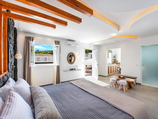 Abasa Suites : photo 6 de la chambre suite supérieure avec bain à remous extérieur