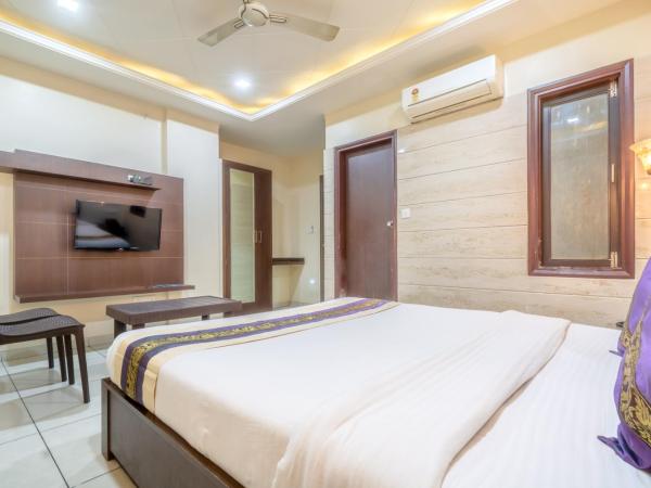 Hotel Sunday Inn : photo 1 de la chambre chambre lit king-size