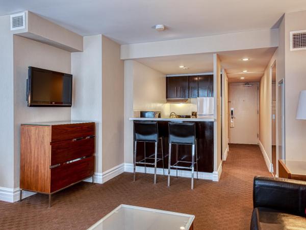 Hôtel Le Cantlie Suites : photo 5 de la chambre suite junior avec lit king-size et canapé-lit