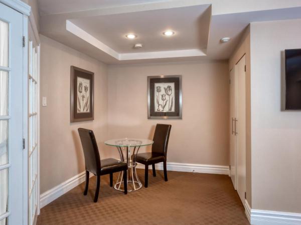 Hôtel Le Cantlie Suites : photo 7 de la chambre suite exécutive avec 2 lits doubles