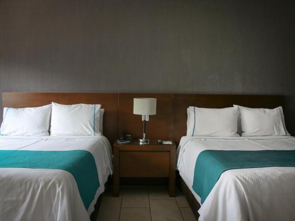 Country Hotel & Suites : photo 6 de la chambre chambre lits jumeaux standard