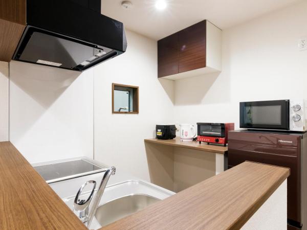 Crescent Moon Nakanoshimbashi : photo 7 de la chambre appartement 1 chambre