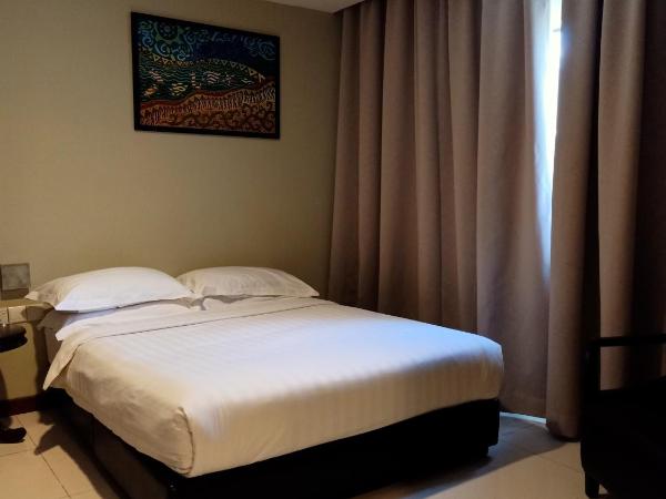 Kinabalu Daya Hotel : photo 1 de la chambre chambre familiale - vue sur ville