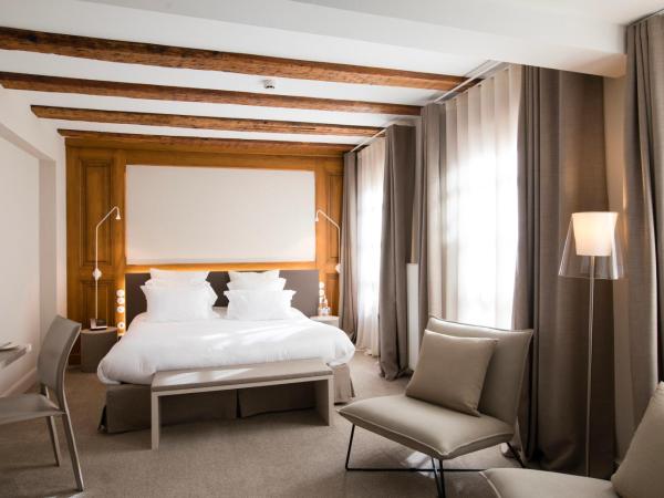 Relais & Châteaux La Maison Des Têtes : photo 1 de la chambre chambre double ou lits jumeaux supérieure