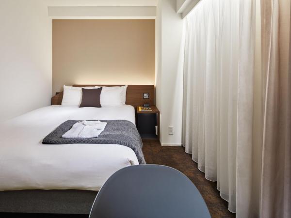 Tenza Hotel & SKYSPA at Sapporo Central : photo 1 de la chambre chambre simple - fumeurs