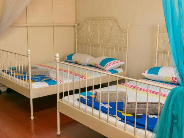 Voyage Home&Guesthouse : photo 8 de la chambre chambre quadruple avec salle de bains commune