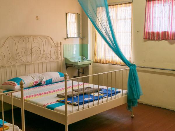 Voyage Home&Guesthouse : photo 7 de la chambre chambre quadruple avec salle de bains commune