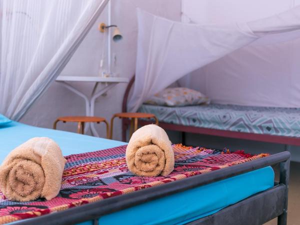 Voyage Home&Guesthouse : photo 6 de la chambre chambre quadruple Économique avec salle de bains commune