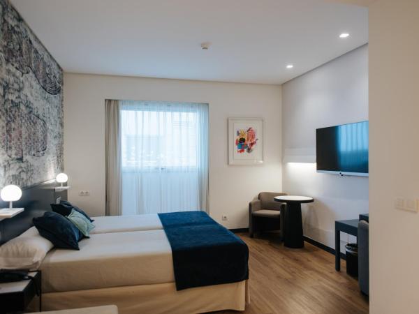 Hotel Neptuno Playa & Spa : photo 10 de la chambre chambre double ou lits jumeaux