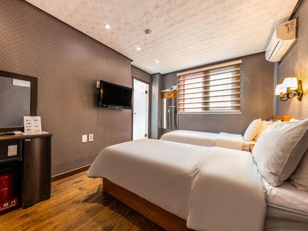 Friendly DH Naissance Hotel by Mindrum Group : photo 5 de la chambre chambre lits jumeaux Économique - petit-déjeuner inclus