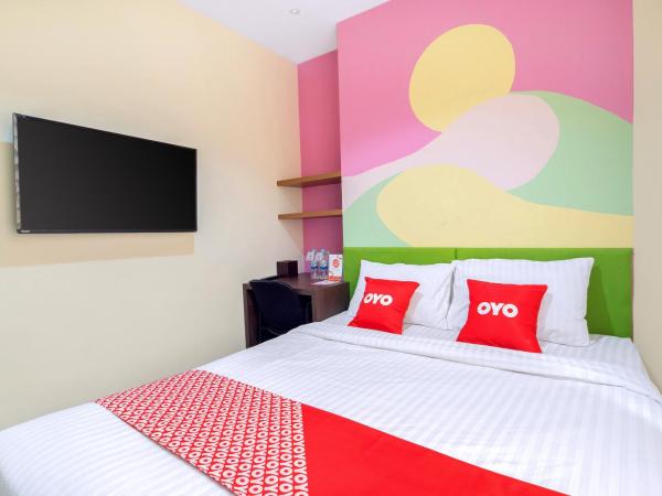 Super OYO Capital O 1121 Orienchi 2 : photo 3 de la chambre chambre double standard