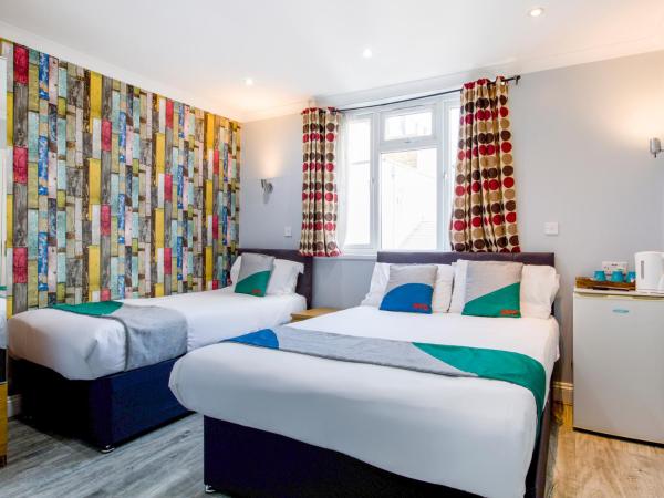 Sino Hotel : photo 1 de la chambre chambre triple standard