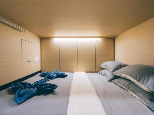 Wanderloft Capsule Hostel : photo 2 de la chambre lit superposé dans dortoir mixte