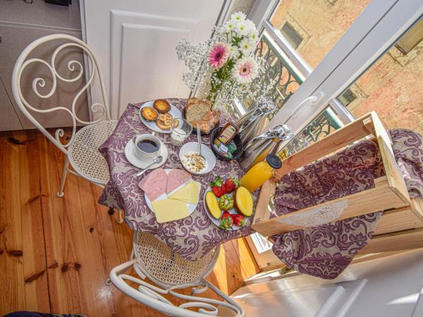 B in B Lisbon Downtown Suites : photo 5 de la chambre suite avec balcon