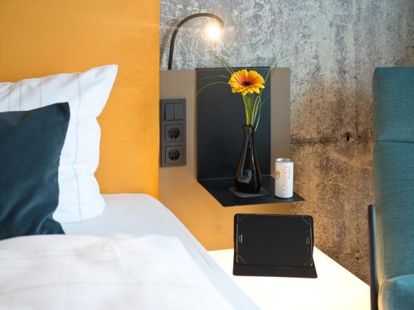 LOGINN Hotel Leipzig : photo 4 de la chambre chambre affaires lits jumeaux