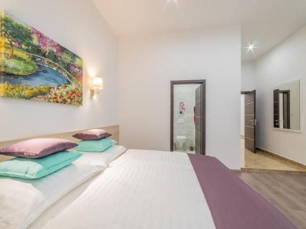 Global Suites Budapest : photo 3 de la chambre chambre double ou lits jumeaux deluxe avec balcon