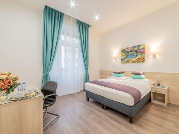 Global Suites Budapest : photo 1 de la chambre chambre double ou lits jumeaux deluxe avec balcon