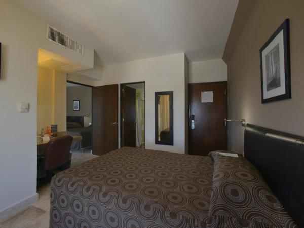 Hotel Mar y Tierra : photo 1 de la chambre chambre triple avec 3 lits doubles 