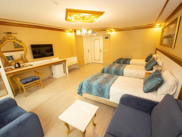 Empire Suite Hotel : photo 7 de la chambre chambre triple deluxe