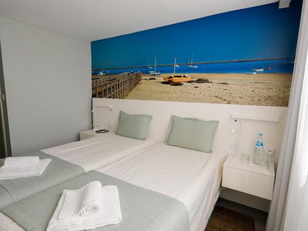 Golden Beach Guest House & Rooftop Bar : photo 2 de la chambre chambre lits jumeaux Économique