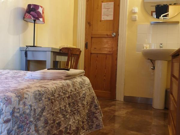 Casa de Huespedes Dolce Vita : photo 10 de la chambre chambre simple avec salle de bains commune