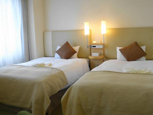 City Plaza Osaka : photo 1 de la chambre chambre lits jumeaux standard - non-fumeurs