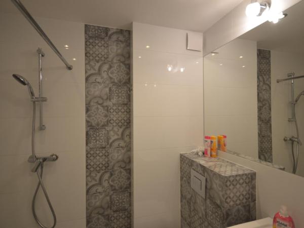 Blue Sail Sopot Apartments : photo 6 de la chambre suite lit king-size