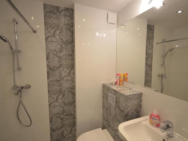 Blue Sail Sopot Apartments : photo 7 de la chambre suite lit king-size