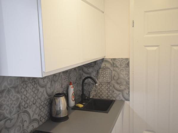 Blue Sail Sopot Apartments : photo 10 de la chambre suite lit king-size