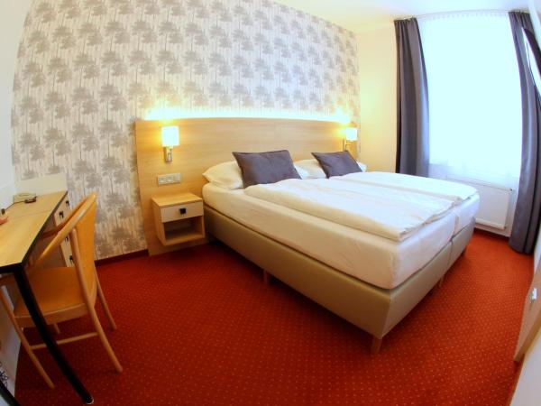 Hotel Flora : photo 1 de la chambre chambre double ou lits jumeaux