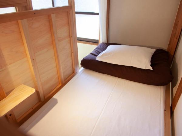 Fukuoka Guesthouse SHIP : photo 1 de la chambre lit simple dans dortoir pour femmes