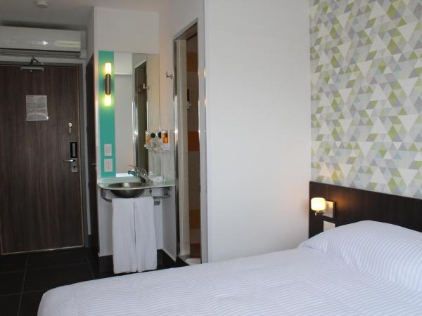 Hotel Hi! Fundidora : photo 3 de la chambre chambre lit queen-size deluxe