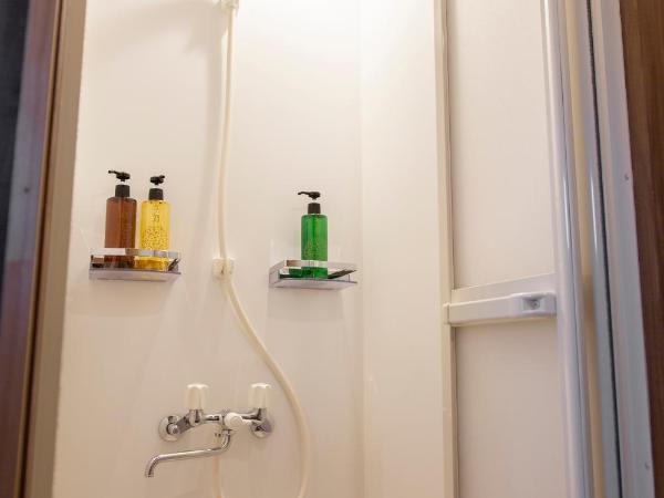 Fukuoka Guesthouse SHIP : photo 9 de la chambre lit simple dans dortoir mixte