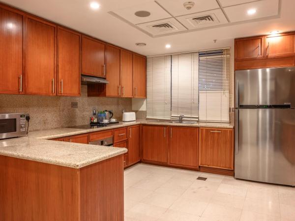 Ramada by Wyndham Downtown Dubai : photo 9 de la chambre penthouse 4 chambres, vue panoramique sur burj khalifa/fontaine, navette aéroport aller-retour gratuite de luxe