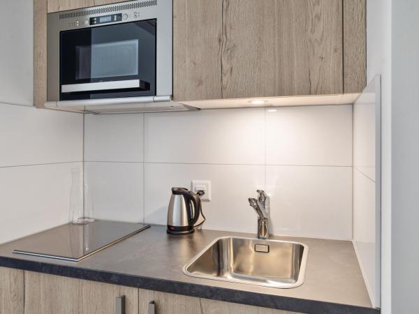 Appart'City Collection Genève Aéroport - Vernier : photo 7 de la chambre studio lits jumeaux