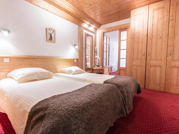 Hotel Club Le Crêt : photo 1 de la chambre chambre quadruple