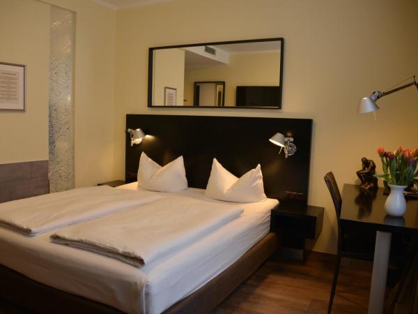 Belle Blue Zentrum : photo 10 de la chambre chambre double