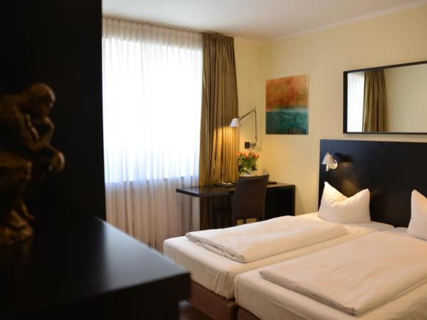 Belle Blue Zentrum : photo 8 de la chambre chambre double