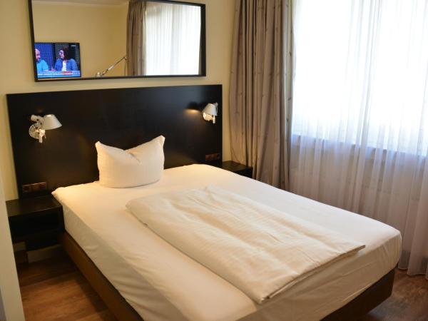 Belle Blue Zentrum : photo 1 de la chambre chambre lit queen-size