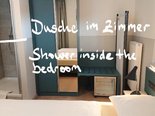 Pension Elisabeth - Rooms & Apartments : photo 5 de la chambre chambre triple avec salle de bains commune