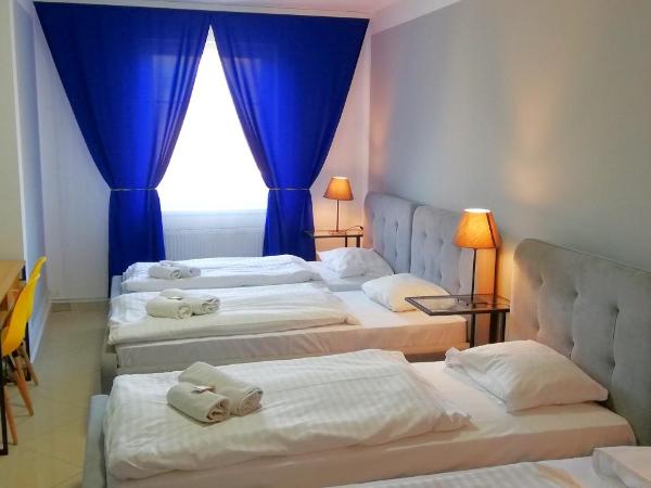 Great Polonia Wrocław City Center : photo 5 de la chambre chambre quadruple