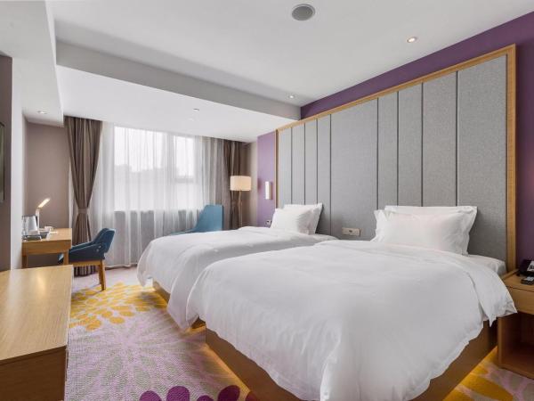 Lavande Hotels·Guangzhou Fangcun Jiaokou Metro Station : photo 6 de la chambre chambre lit king-size de luxe