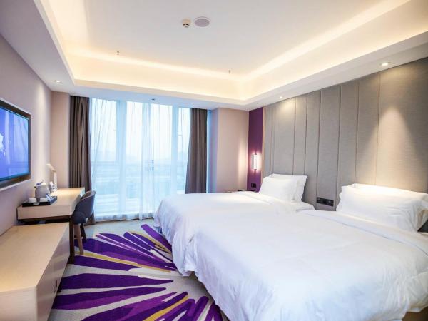 Lavande Hotel Chongqing West Station Baguo Cheng : photo 1 de la chambre chambre lits jumeaux affaires